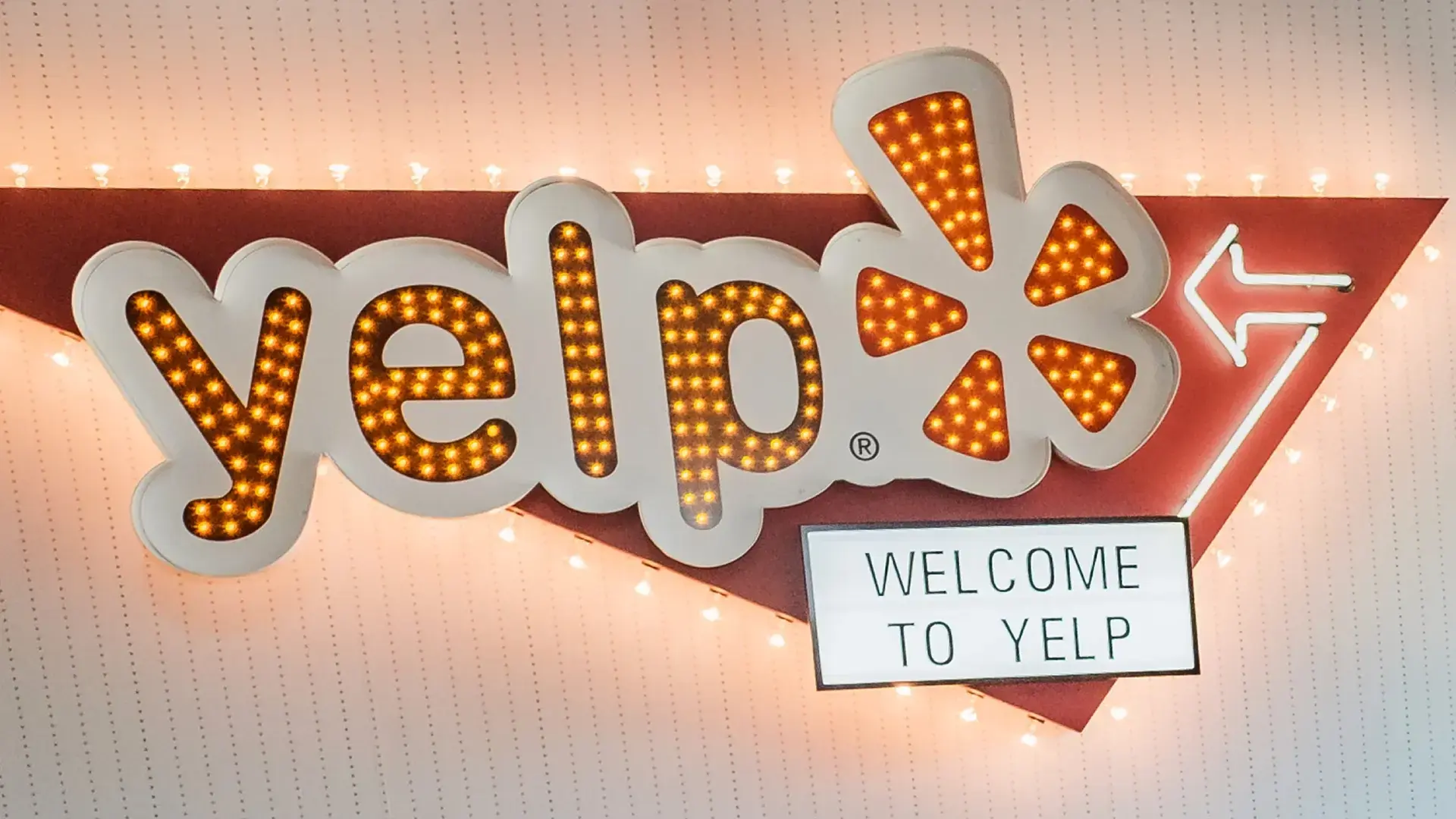 A sign displaying the word "Yelp"